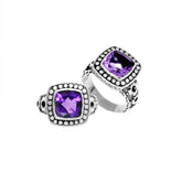 Handmade sterling silver Balinese ring with cushion-cut Amethyst Quartz in a dotted bezel design.